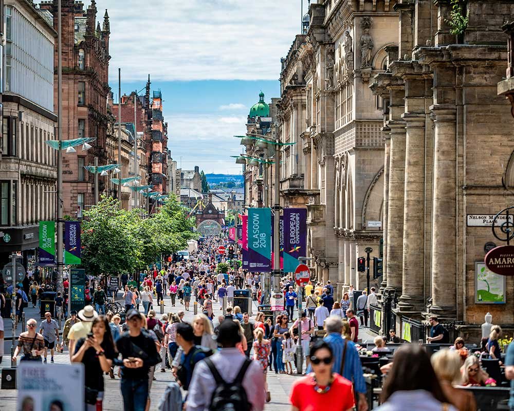 Tourists in Glasgow City Center near Madurai restaurant